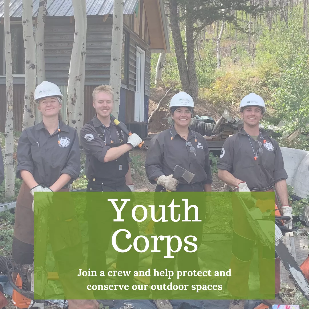 Photo of a group of individuals in the woods wearing hard hats and holding tools. Text: Youth Corps: Join a crew and help protect and conserve our outdoor spaces